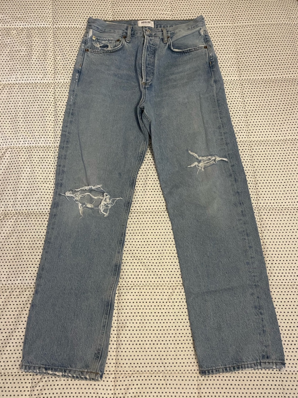 Agolde light blue denim jeans with subtle distressing